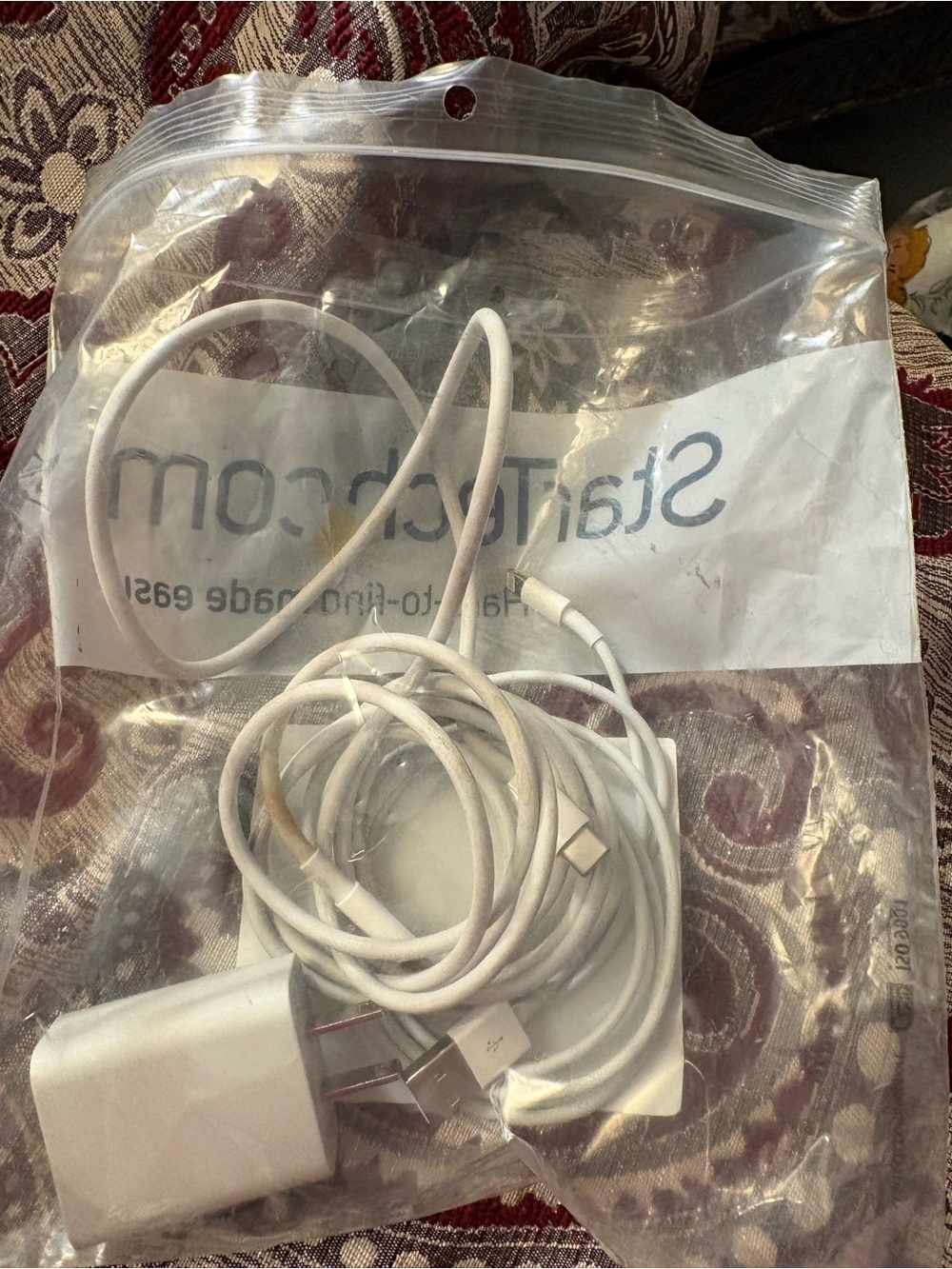 White USB-C to Lightning Charging Cable and Power Adapter